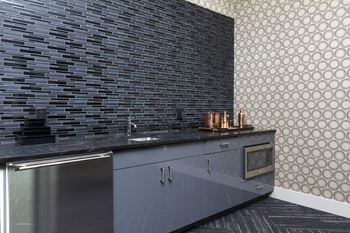 Gaming room with wet bar